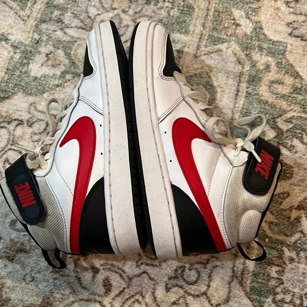 These are Nike shoes they are slightly worn deep cleaned and kids 5.
